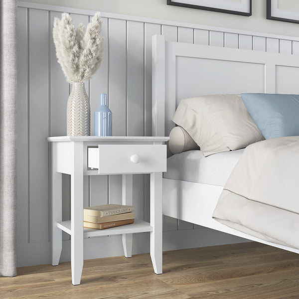 Bedside table N01 wooden white in bedroom – arrangement with bedside lamp