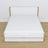 Double bed with wooden drawer white with oak – angled view, scandi bedroom
