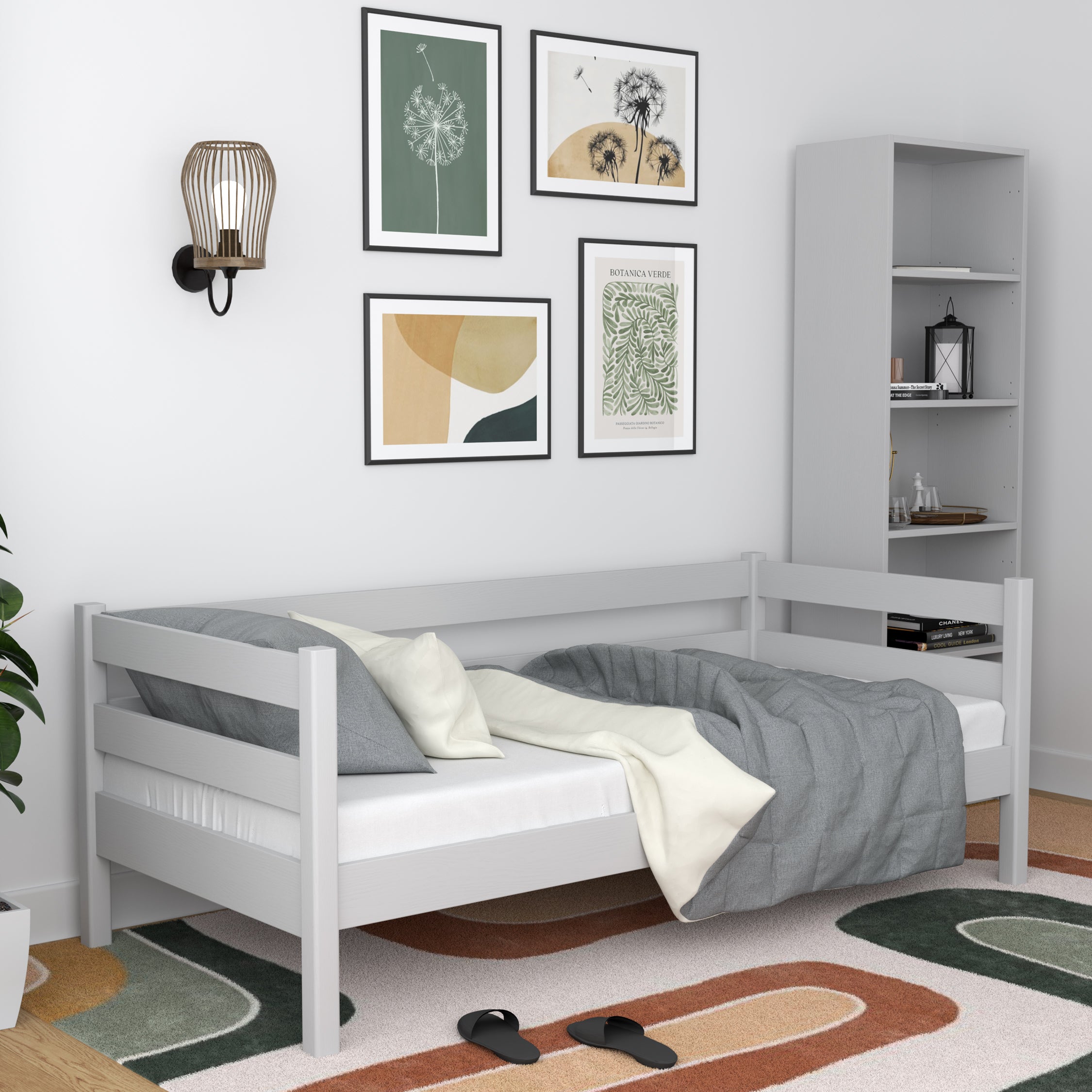 Grey sofa bed in a child’s room – scandi arrangement, wooden