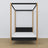 Wooden black-oak canopy bed – close-up of canopy and headboard