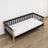 Sofa bed black with oak in a children’s room – scandi arrangement, wooden