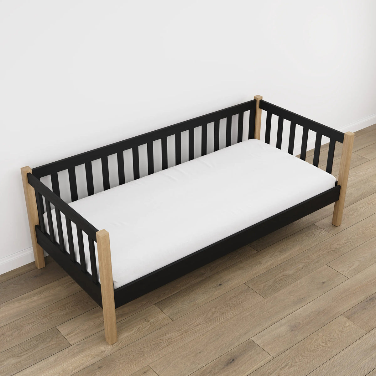 Sofa bed black with oak in a children’s room – scandi arrangement, wooden