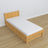 Natural pine bed – mattress drawer, wooden details, Nizio Home