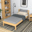 Single wooden bed natural pine – side view, furniture proportions