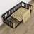 Sofa bed wooden black with oak – angled view, Scandinavian style