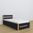 Wooden bed with mattress drawer black-oak – child’s room arrangement
