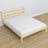 Double bed clear pine in bedroom – bedding arrangement with bedding, scandi style